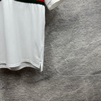 Gucci polo shirt in white with short sleeves and side slit at the hem