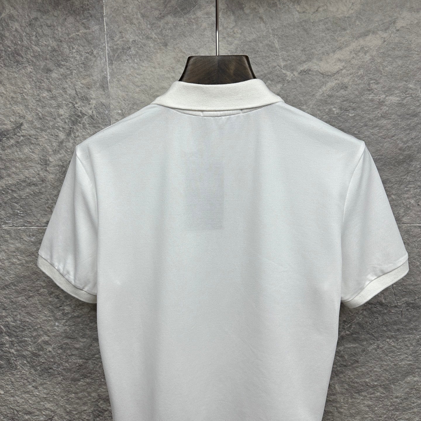 Gucci polo shirt in white, back view with stand collar and short sleeves