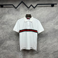 Gucci polo shirt in white with red and green striped band across the chest