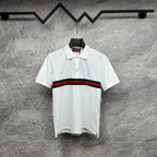 Gucci polo shirt in white with red and green striped band across the chest