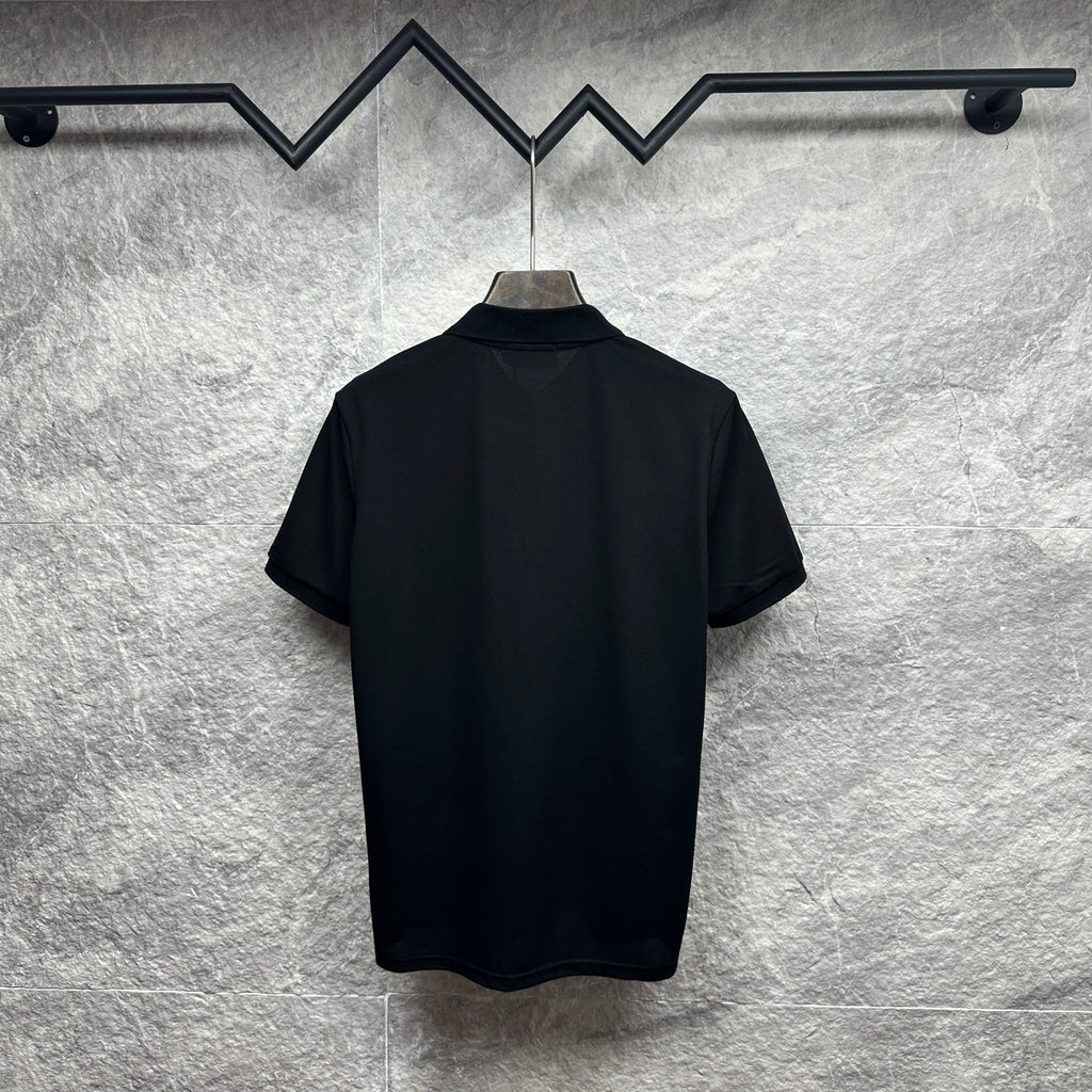 Black Gucci polo shirt back view with short sleeves and no visible graphics.