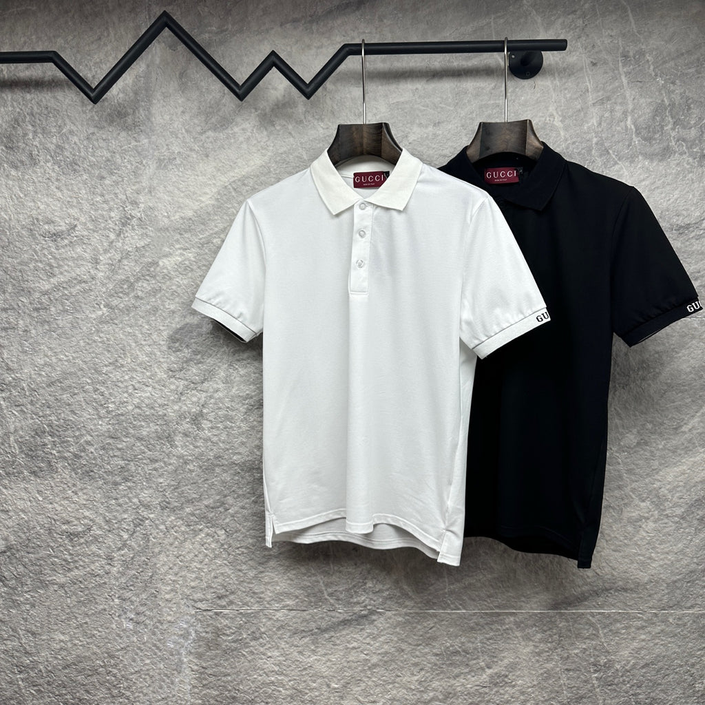 Pair of Gucci polo shirts: white and black, with collars and sleeve logo details