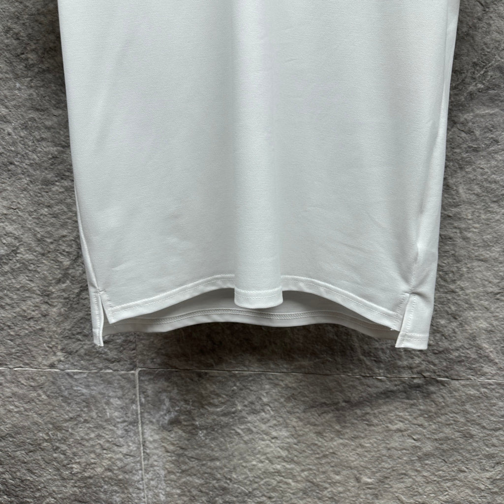White Gucci polo shirt hem with side slit and stitched border