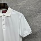 White Gucci polo shirt close-up with short sleeve and side embroidered GUCCI