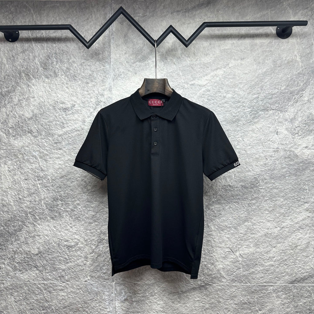 Black Gucci polo shirt with button placket and short sleeves