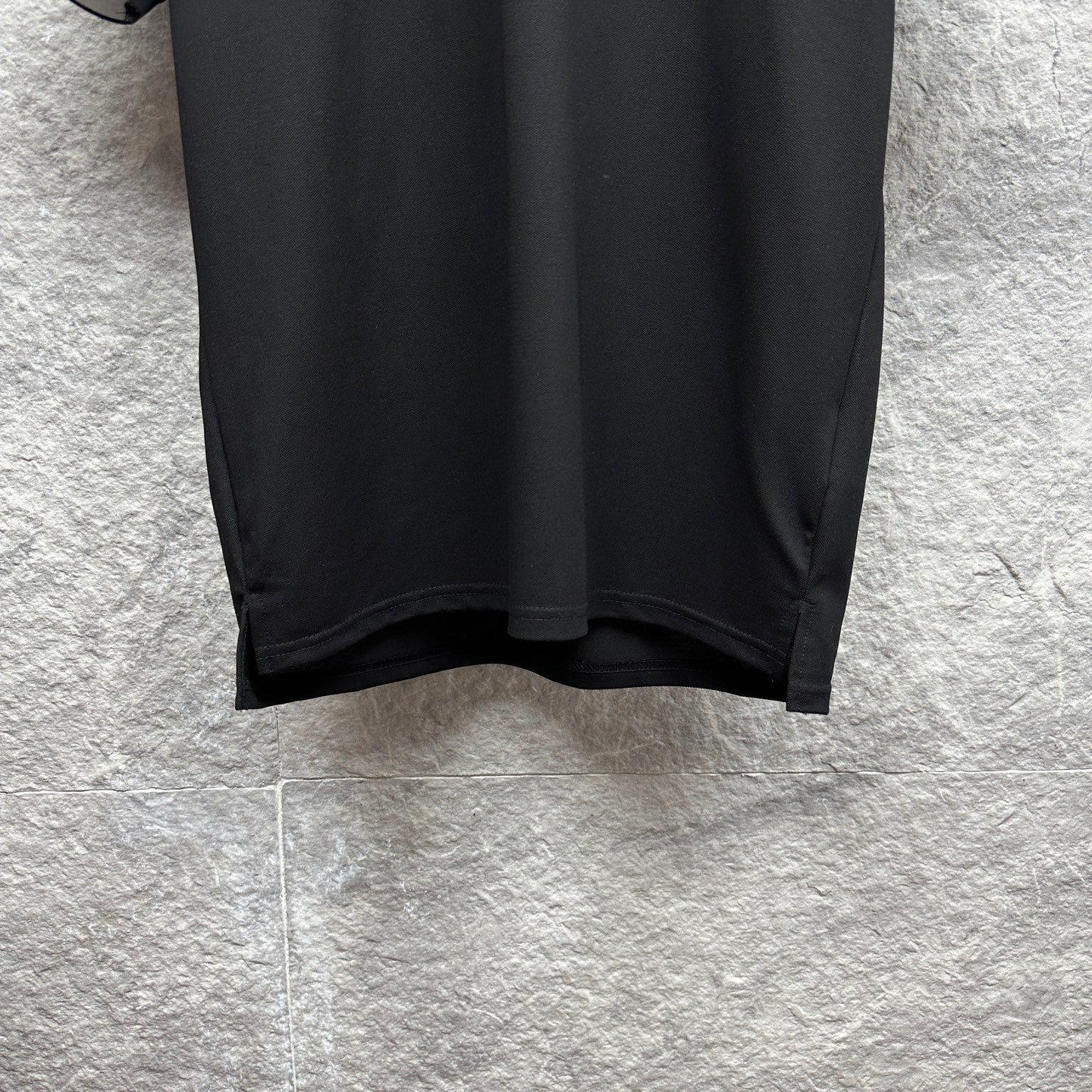 Black Gucci polo shirt curved hem