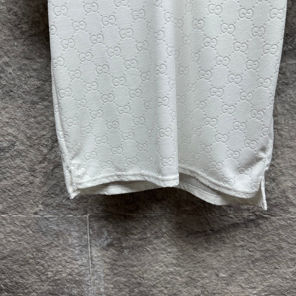 Gucci short-sleeve polo shirt, white GG pattern, curved hem with side slits