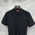Black Gucci polo shirt with collar and buttons, short sleeves, subtle GG monogram.