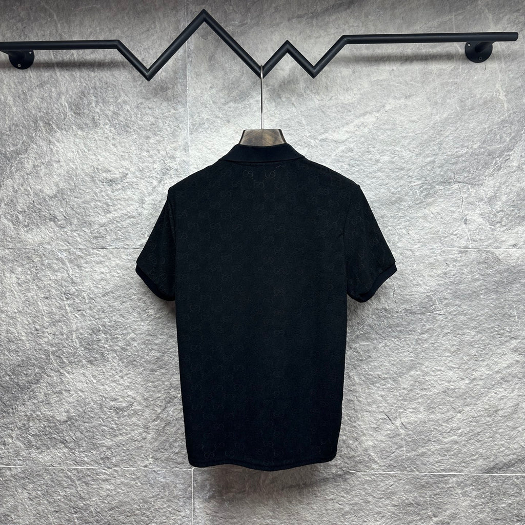 Black Gucci polo shirt, back view, short sleeves, GG monogram pattern.