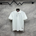 White Gucci polo shirt with allover GG pattern, short sleeves, buttoned collar