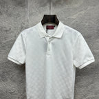 White Gucci polo shirt with subtle GG monogram pattern, short sleeves, button front