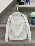 Moncler jacket back, white with navy-trim shoulder seam and elastic hem