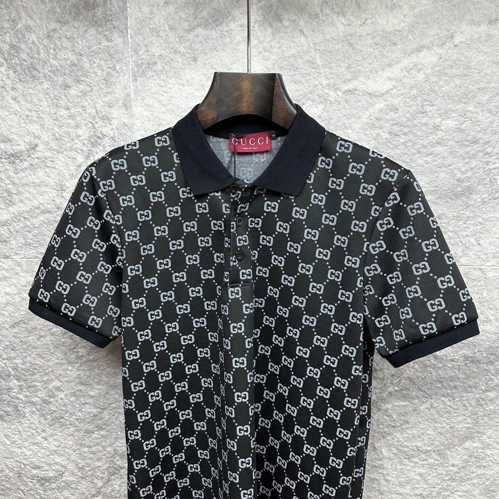 Gucci polo shirt close-up, dark navy GG pattern with collared button front