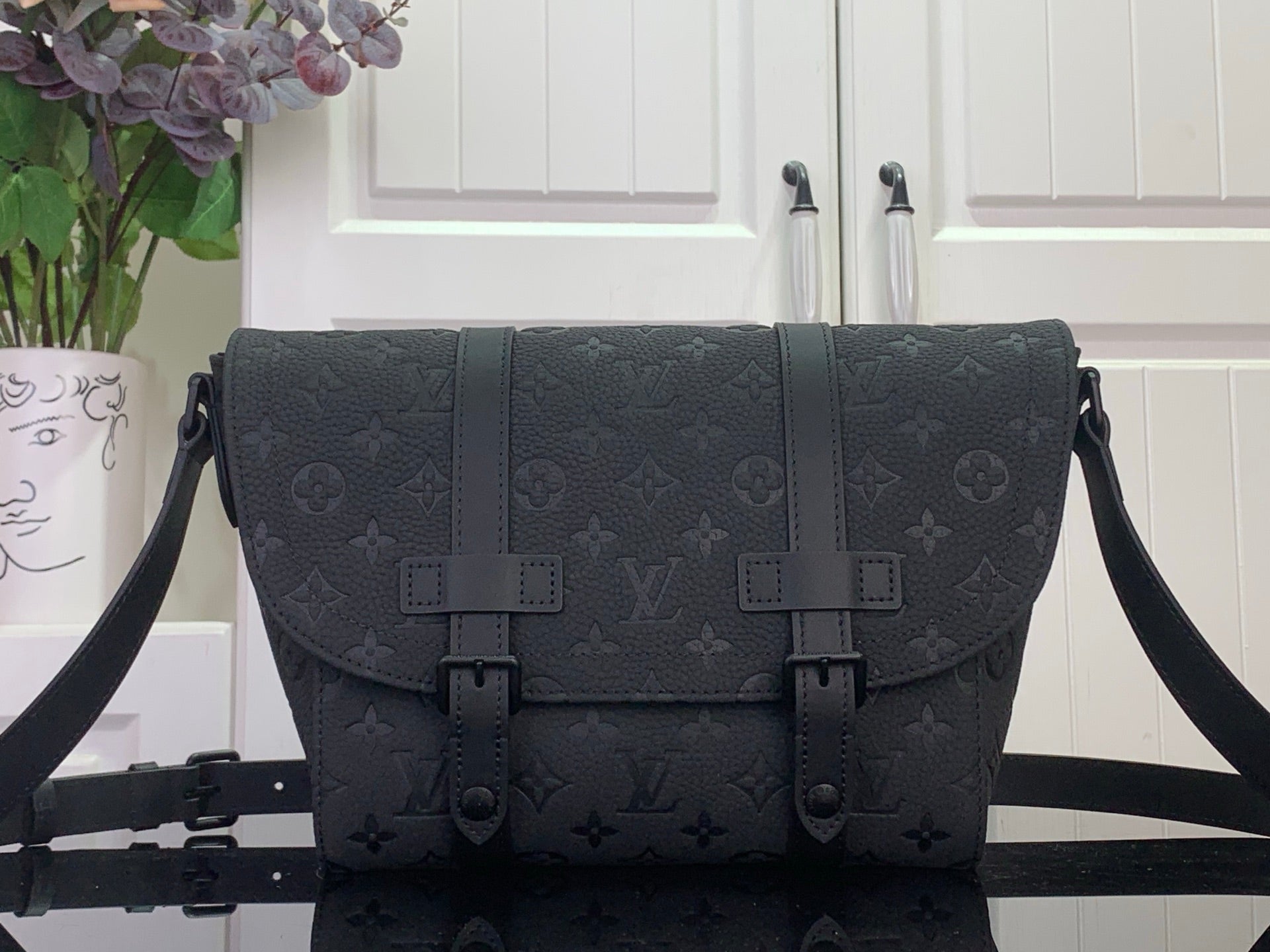 Louis Vuitton shoulder bag in dark monogram canvas, flap with buckles and straps