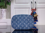 Louis Vuitton blue monogram canvas bag with rounded top and gold zipper