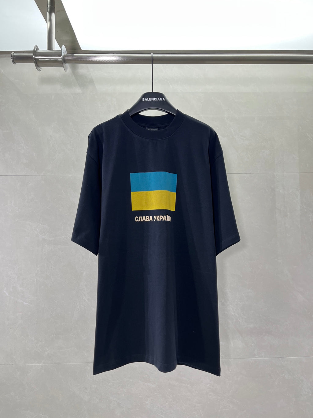 Balenciaga crew-neck T-shirt in dark fabric with blue-yellow flag graphic on front