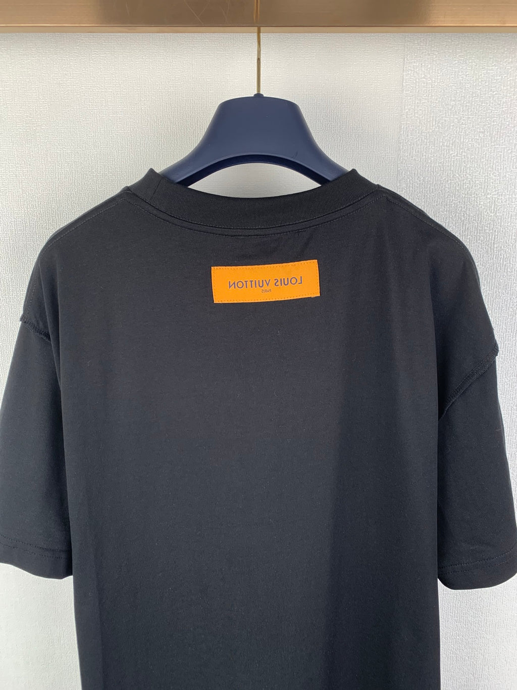 Louis Vuitton T-shirt back with yellow label near collar, dark black
