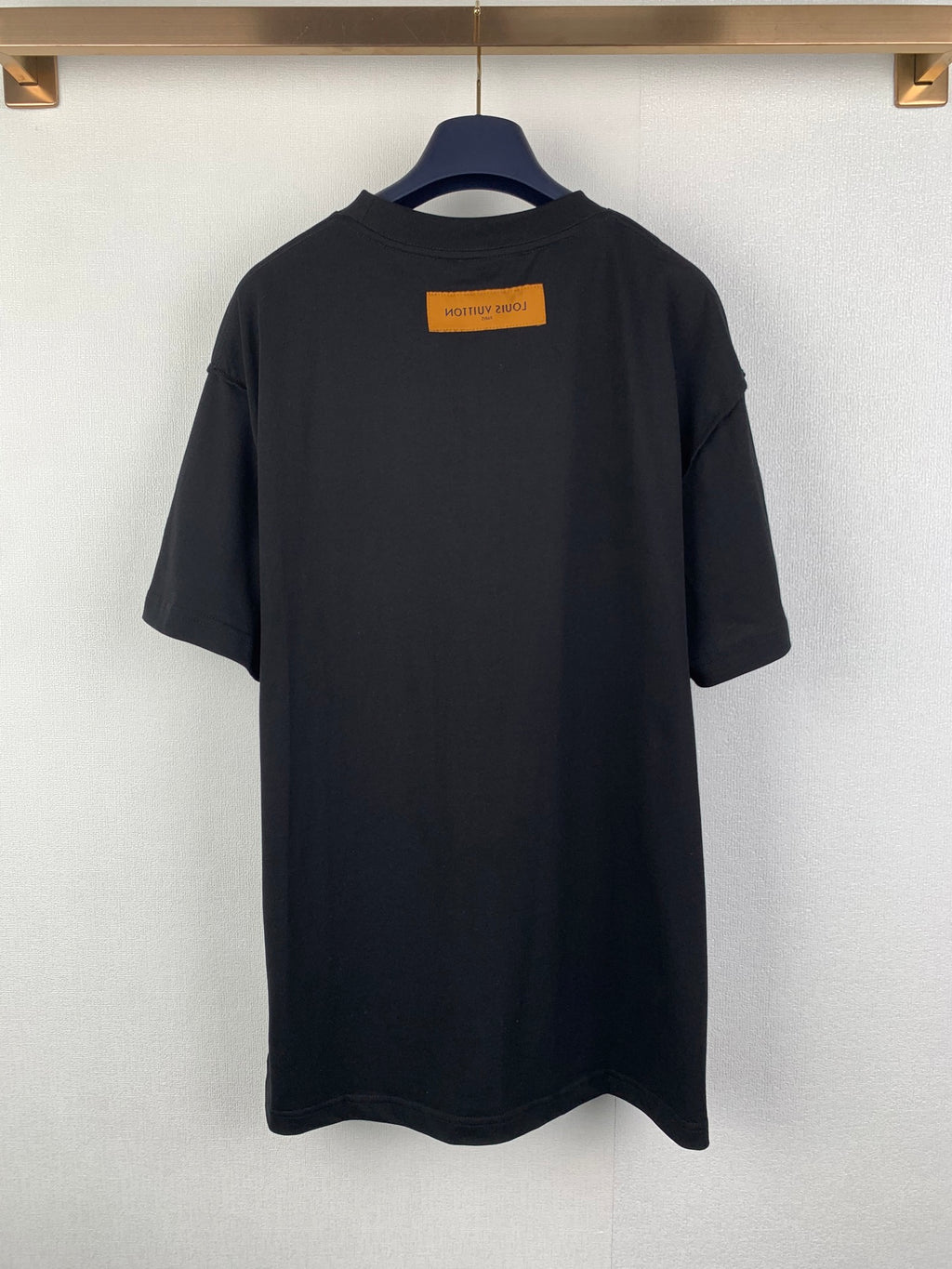 Louis Vuitton T-shirt back view with yellow label, dark black