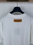 White T-shirt back neckline with printed logo label above.