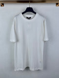 White short-sleeve T-shirt with crew neck and small LV logo on chest.