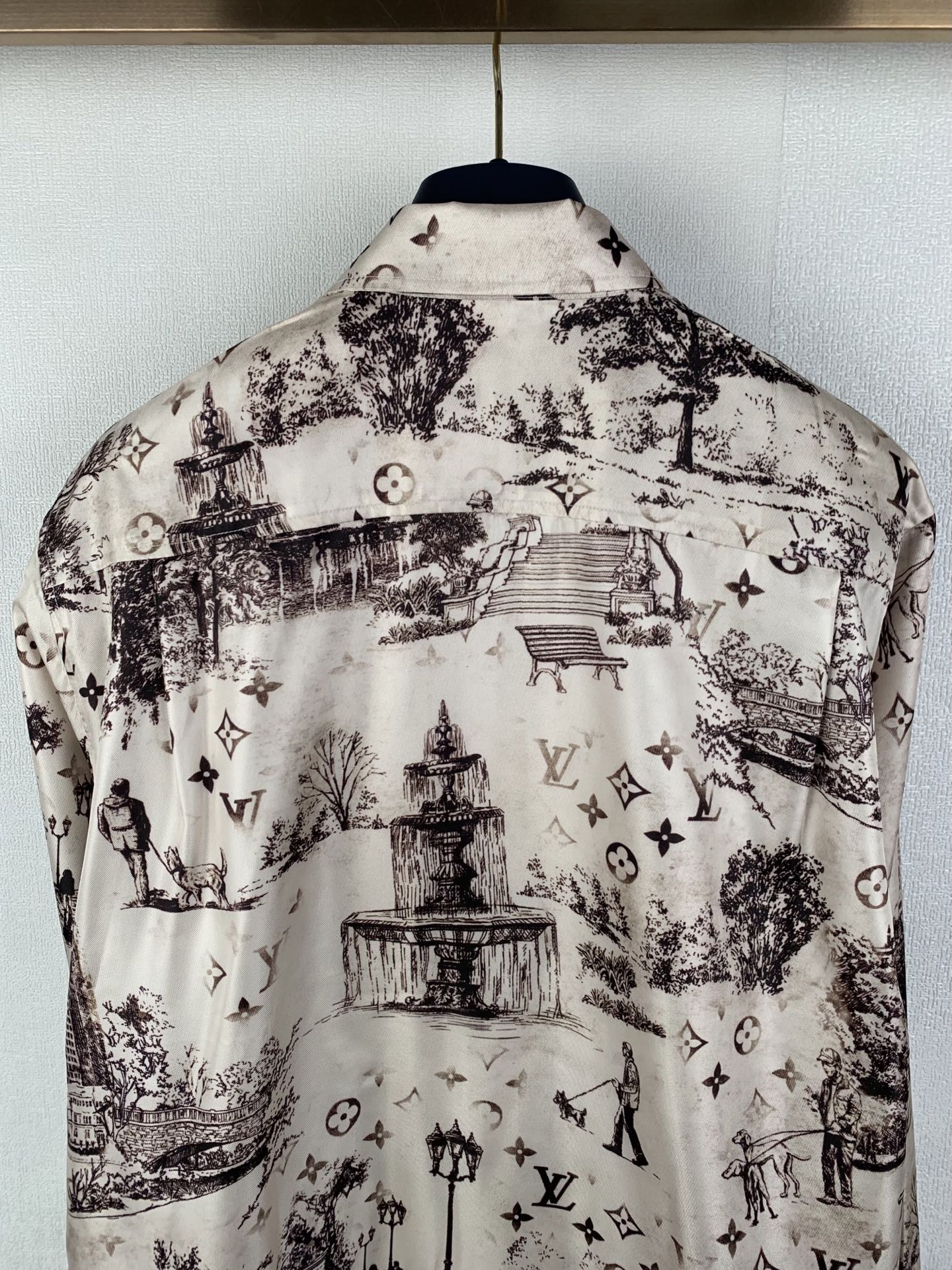 Men's button-up long-sleeve shirt back view, white with dark city fountain print