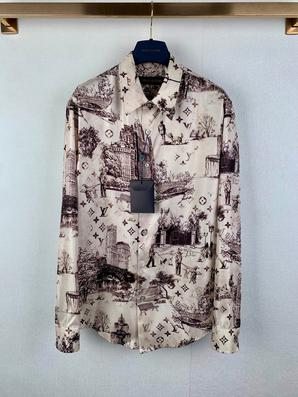 Men's button-up long-sleeve shirt with white base and dark city print