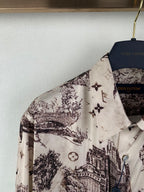 Men's button-up shirt shoulder and collar, white with dark city and emblem print