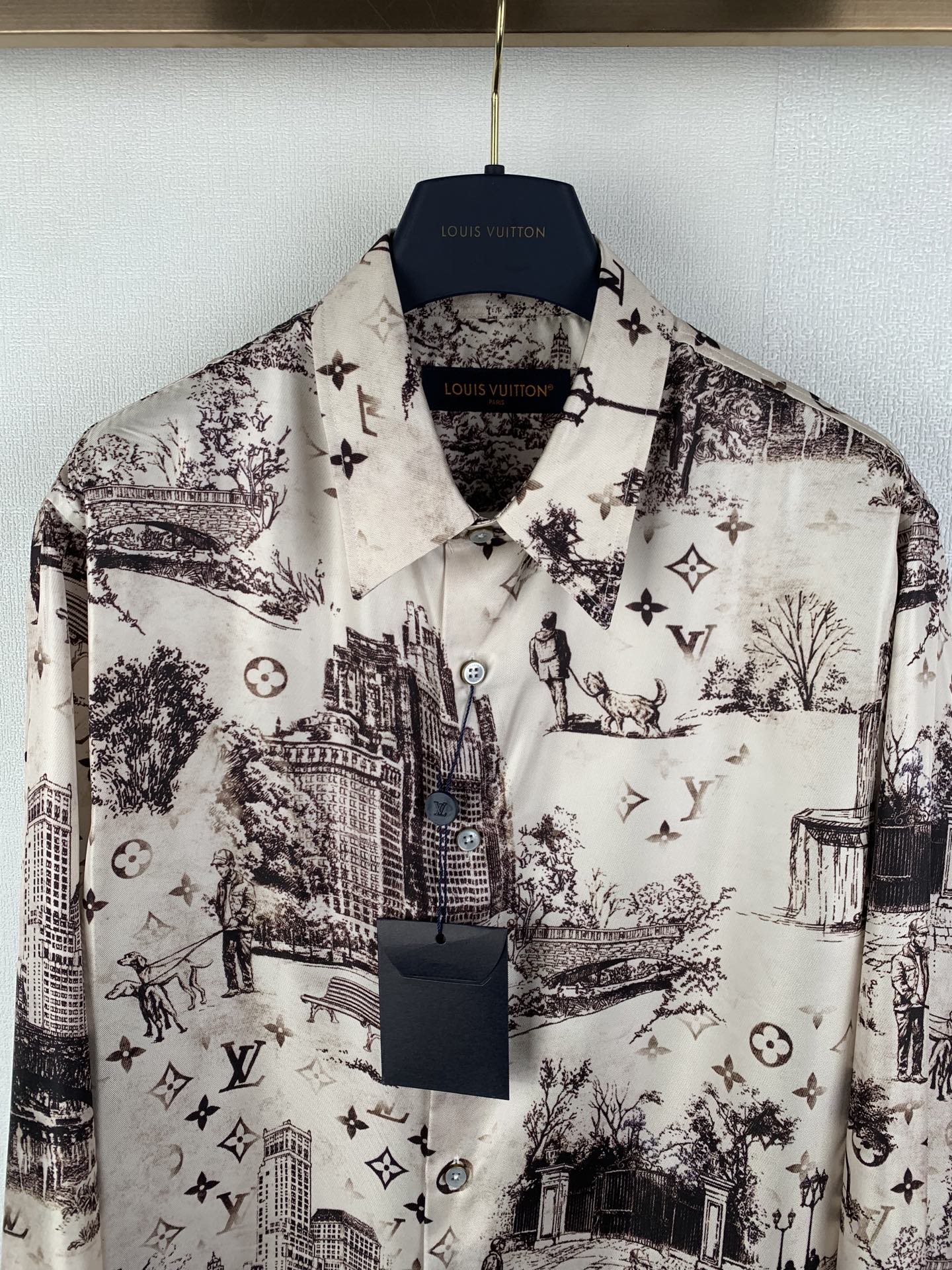Men's button-up long-sleeve shirt, white with dark allover city and emblem print