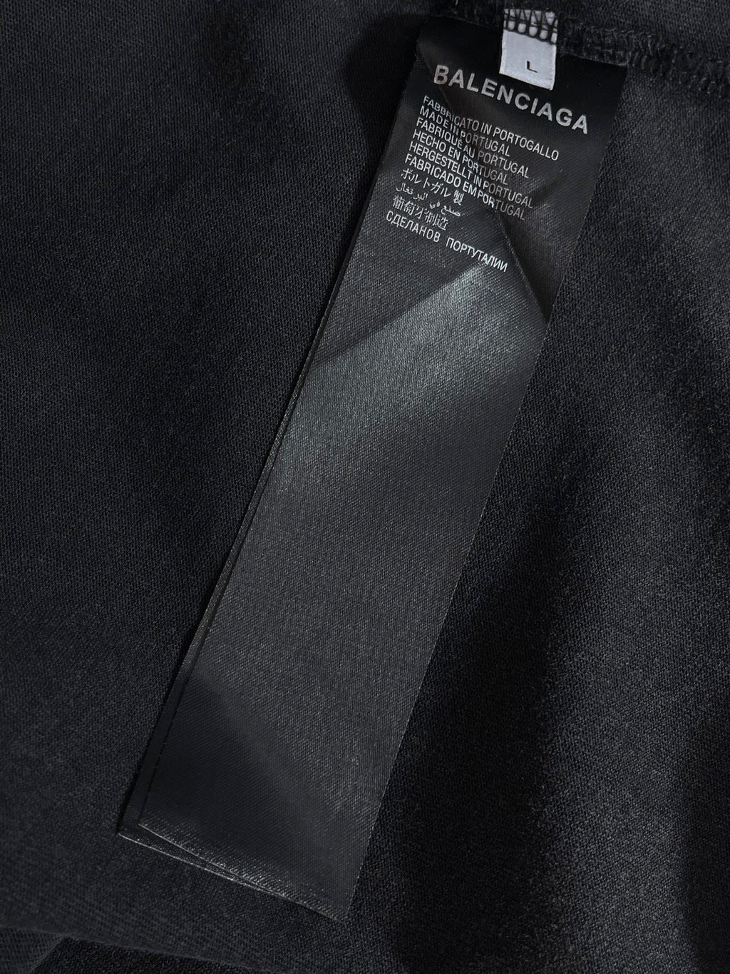 Dark T-shirt inner size and care label with BALENCIAGA branding