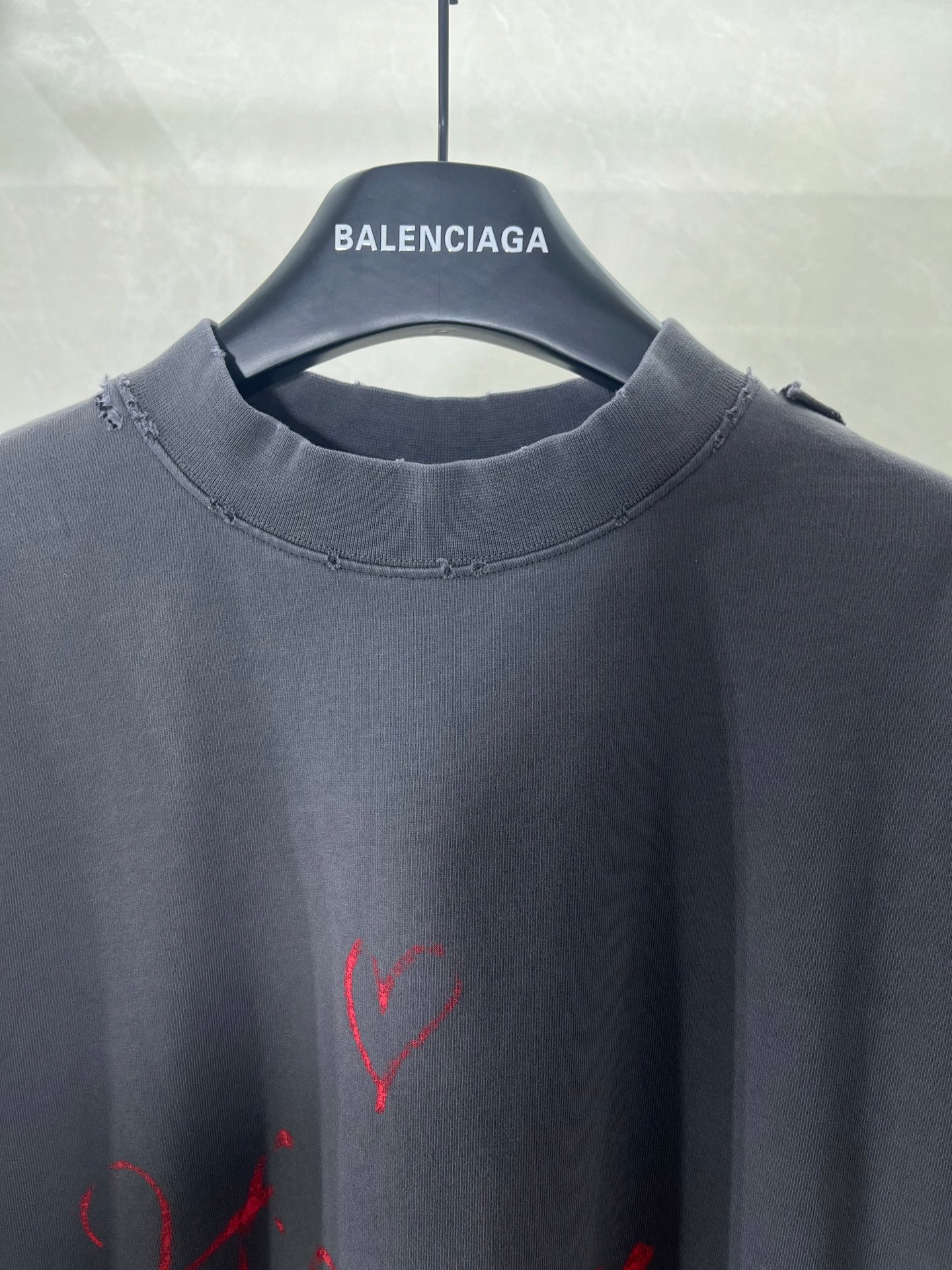 Balenciaga dark navy crew-neck T-shirt with red heart graphic on chest