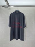 Balenciaga dark navy graphic T-shirt with red heart-style print, front view