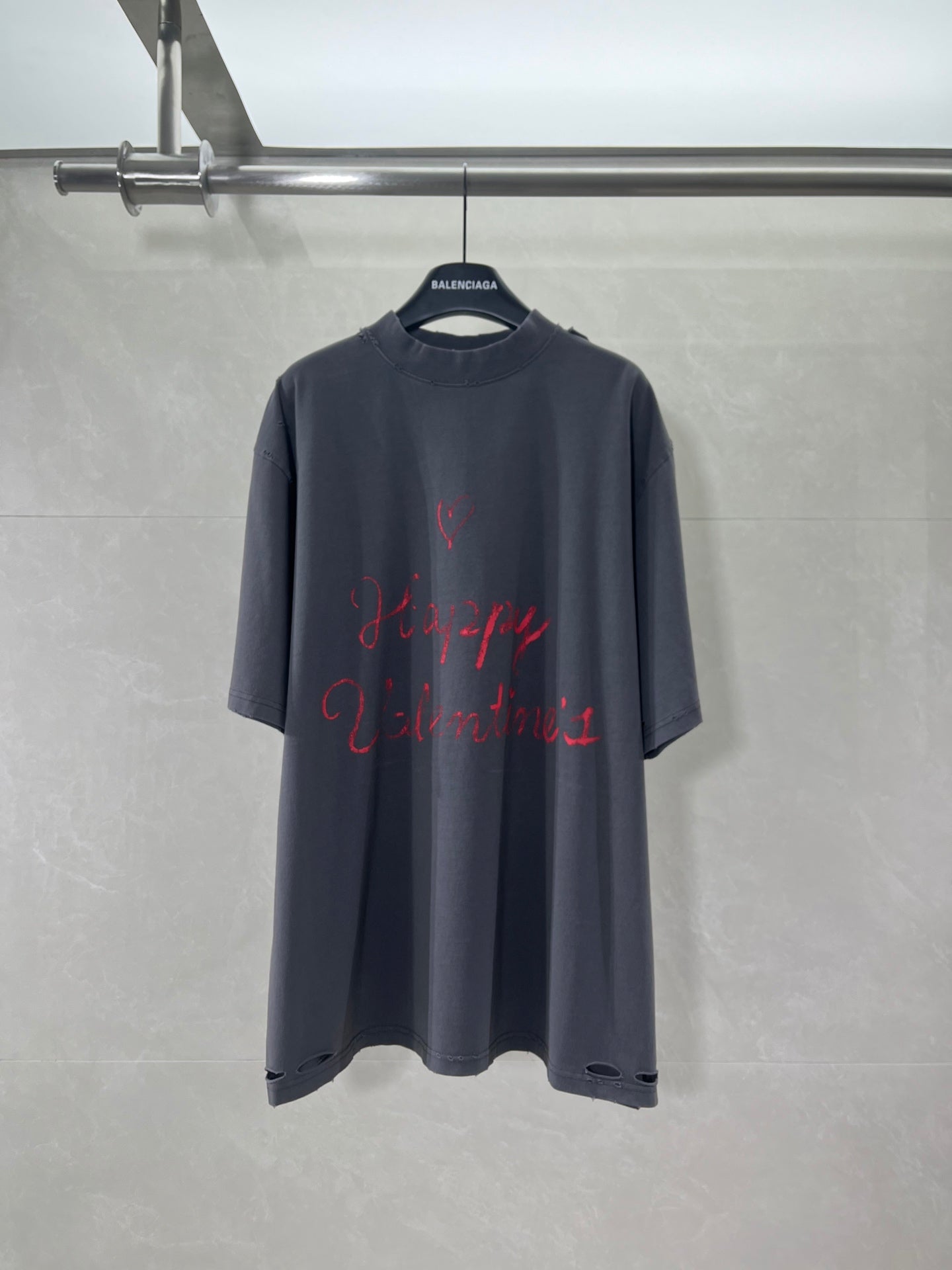 Balenciaga dark navy graphic T-shirt with red heart-style print, front view