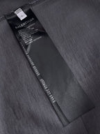 Balenciaga black fabric care label and size tag inside collar