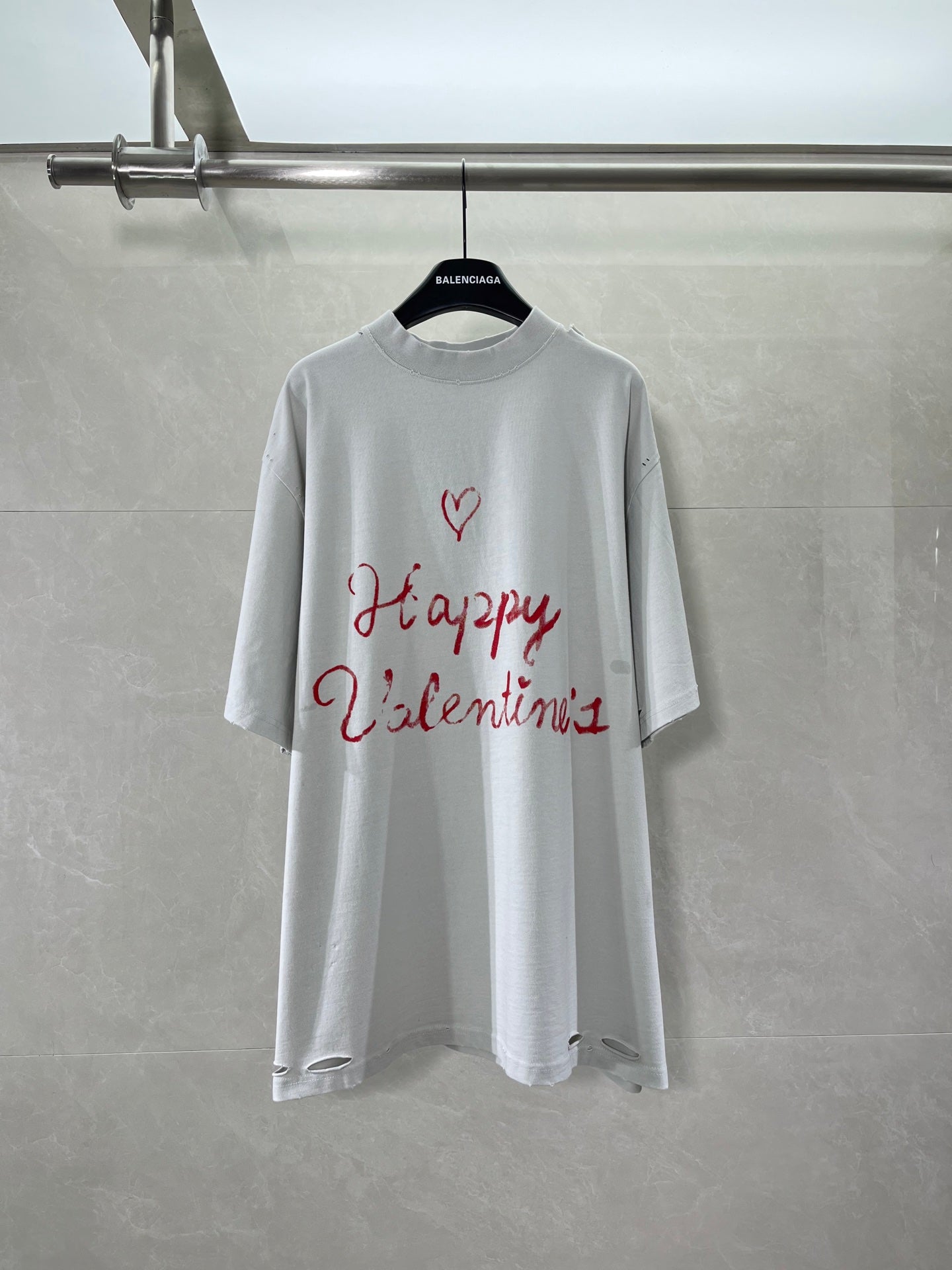 Balenciaga short-sleeve T-shirt, white with red heart and “Happy Valentine’s” text