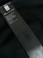 Balenciaga T-shirt size and care label on inner seam, marked L
