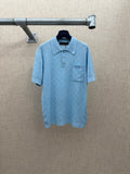 Light blue polo shirt with button placket and chest pocket