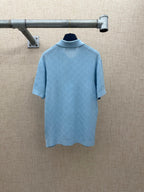 Light blue polo shirt back view with short sleeves
