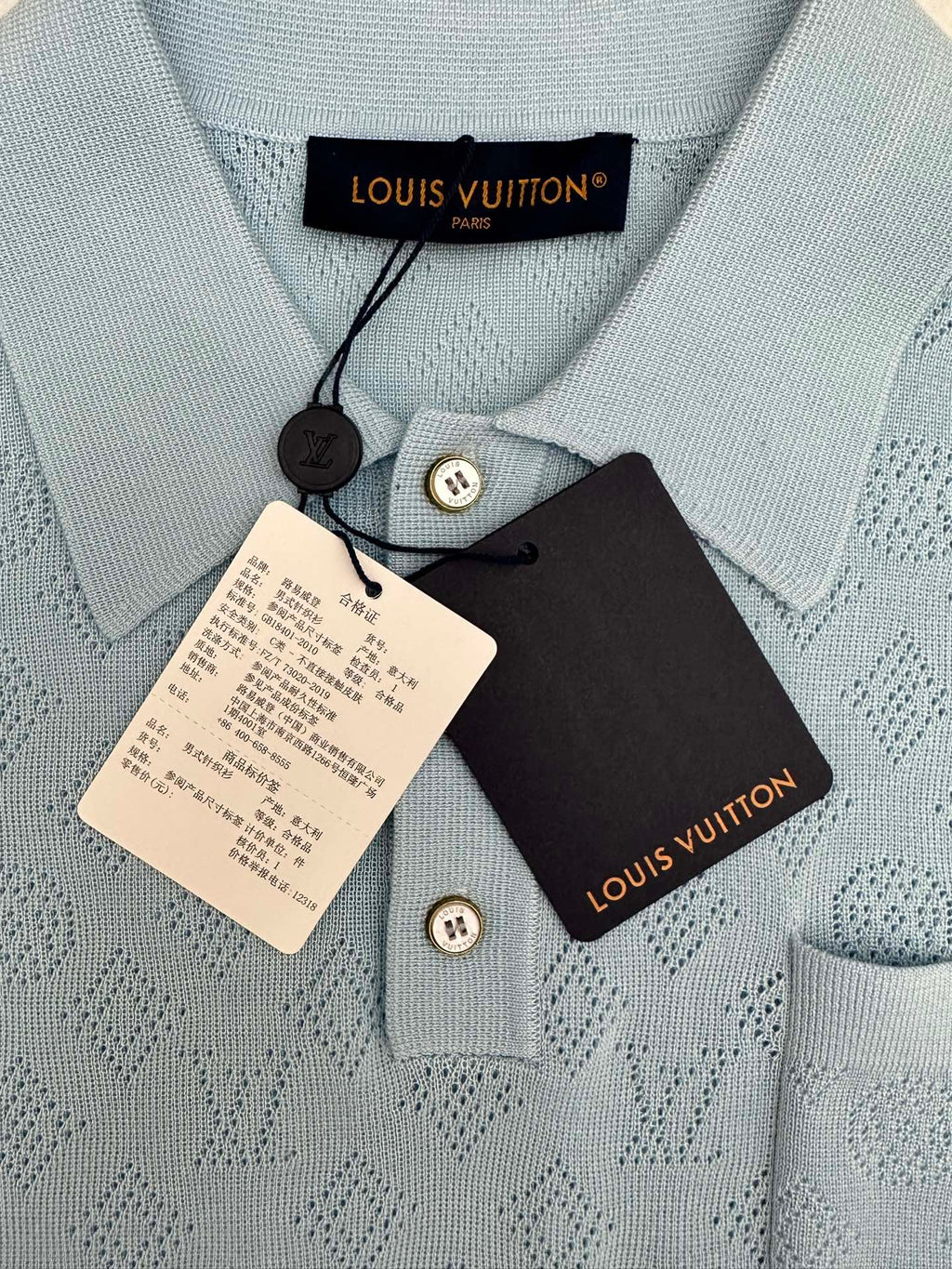 Light blue knit polo collar with Louis Vuitton care tags and buttons