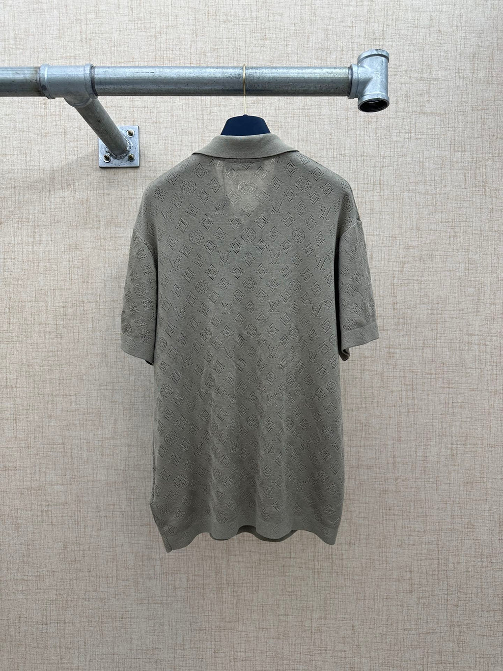 Light gray polo shirt back view with short sleeves