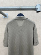 Light gray polo shirt back with raised collar detail