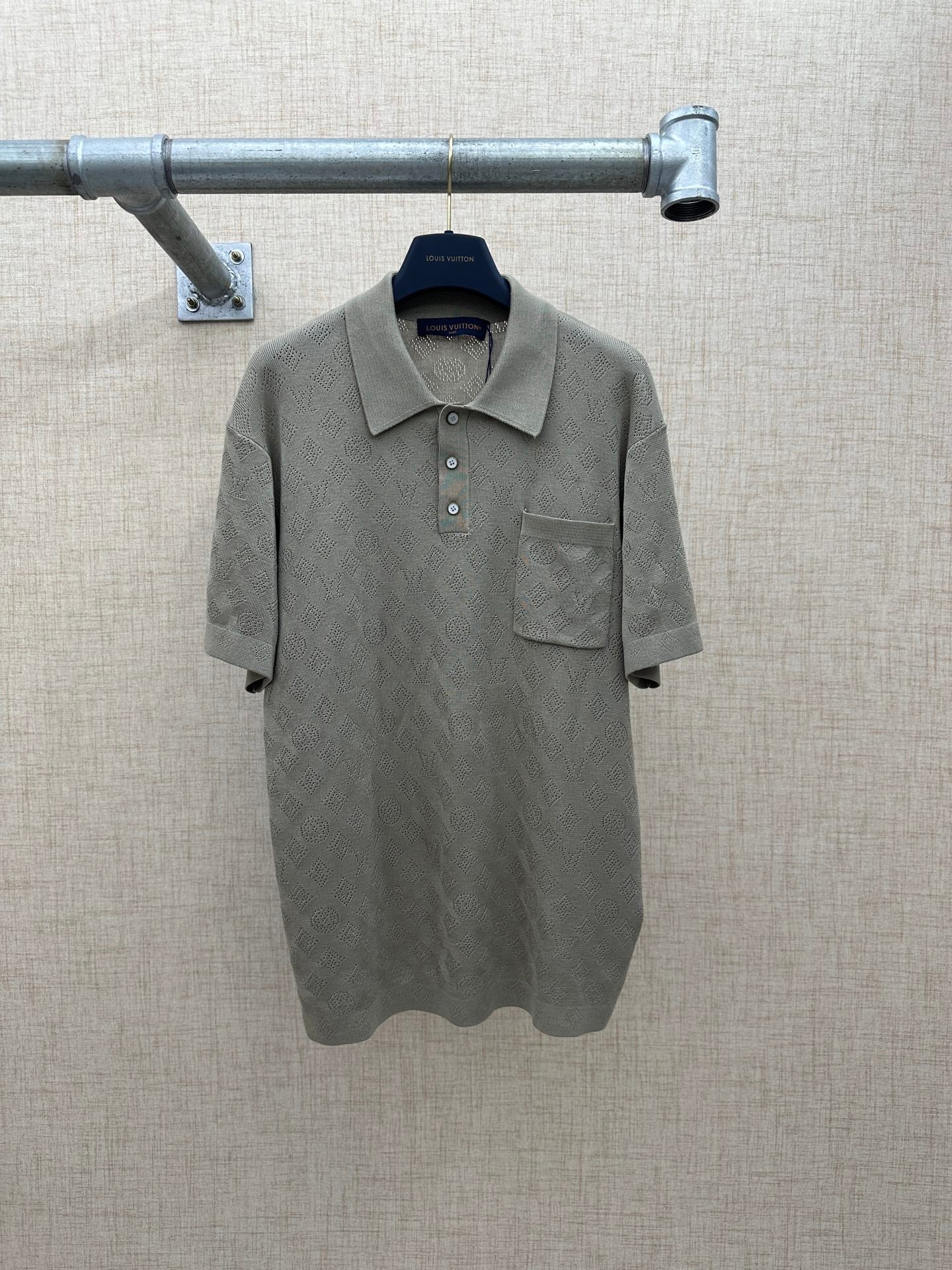Gray short-sleeve polo shirt with button placket and chest pocket