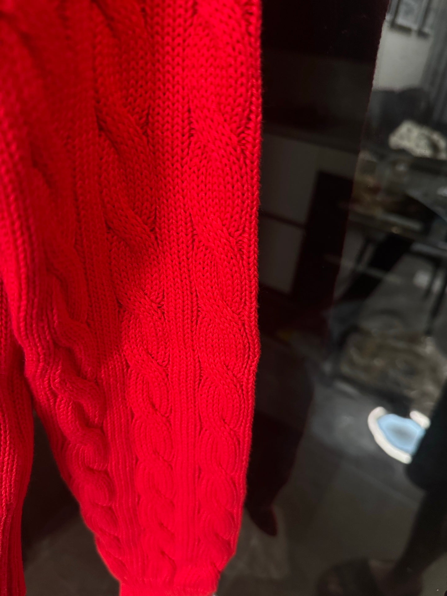 Ralph Lauren cardigan sleeve, red cable-knit texture with ribbed cuff
