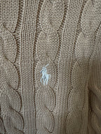 Ralph Lauren cable-knit cardigan chest detail, button placket and light tan knit