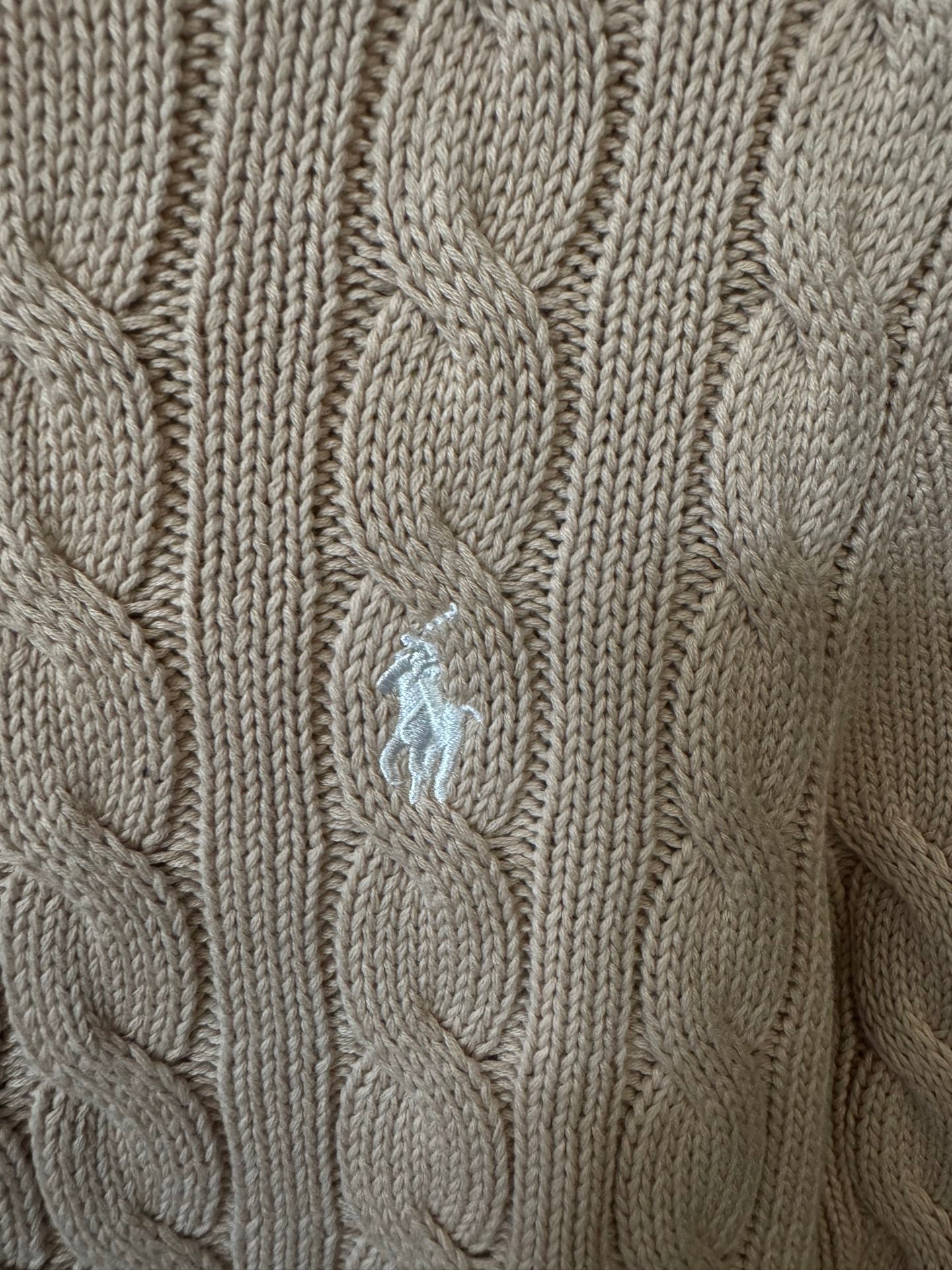 Ralph Lauren cable-knit cardigan chest detail, button placket and light tan knit
