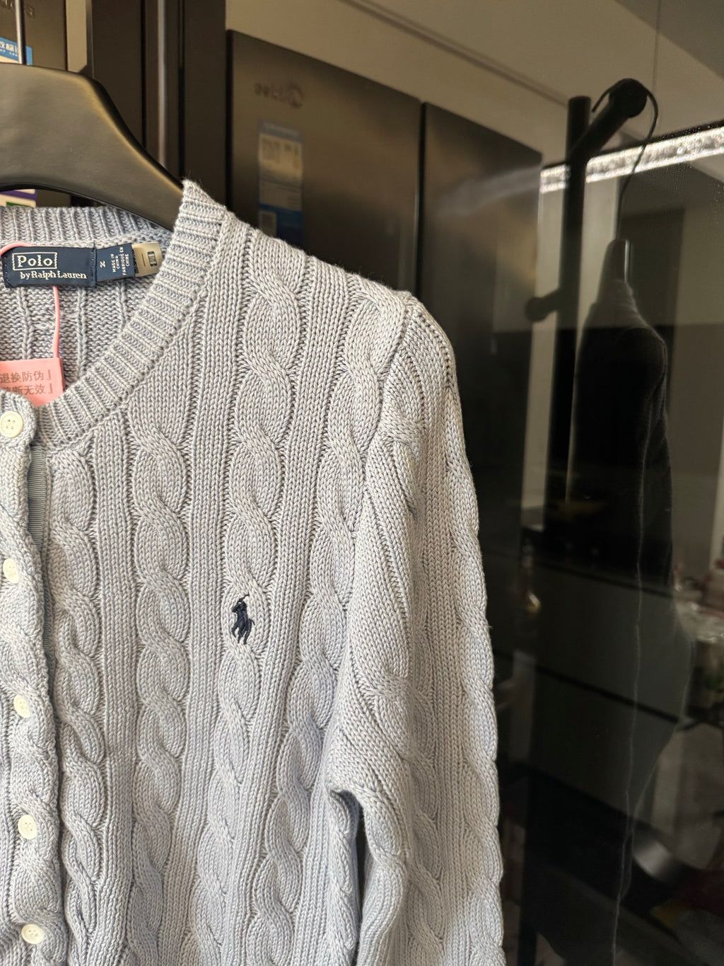 Ralph Lauren cable-knit cardigan sleeve and side, cream textured cable knit.