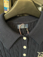 Ralph Lauren knit polo collar close-up, dark navy, three-button placket