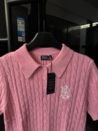 Pink cable-knit polo shirt collar with button placket and RL emblem