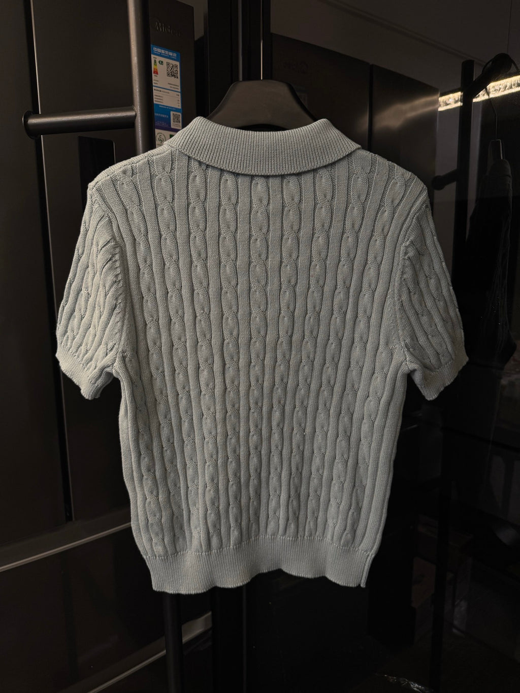 Gray cable-knit polo sweater, crew neck with ribbed collar and short sleeves