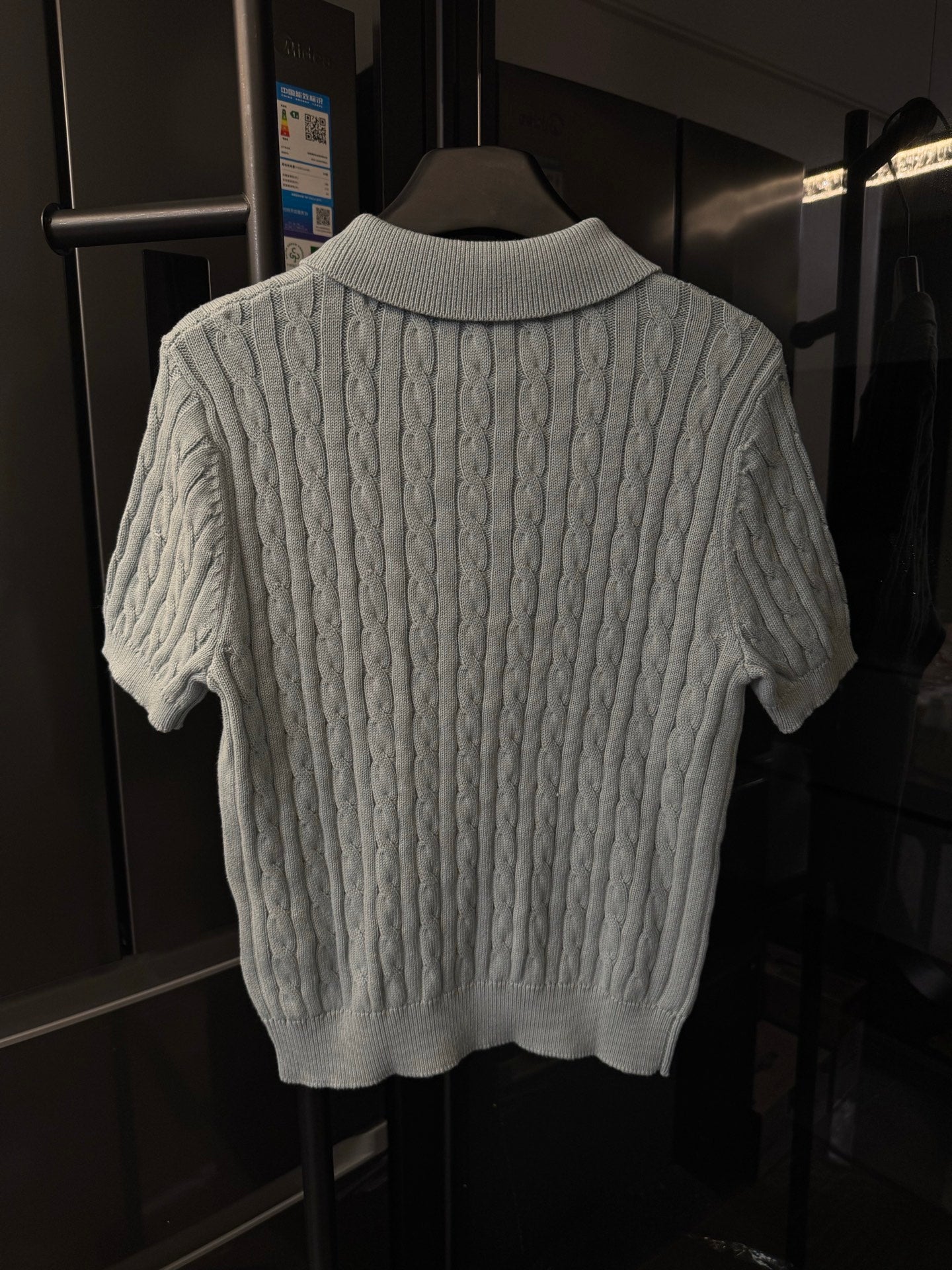 Gray cable-knit polo sweater, crew neck with ribbed collar and short sleeves