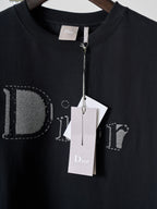 Dior short-sleeve T-shirt close-up, black crew neck with Dior logo